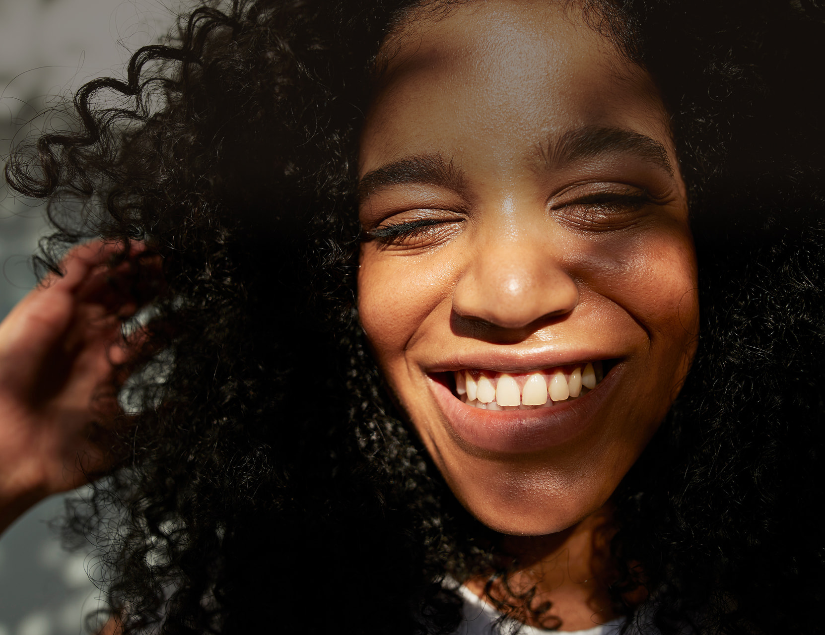 A woman smiling