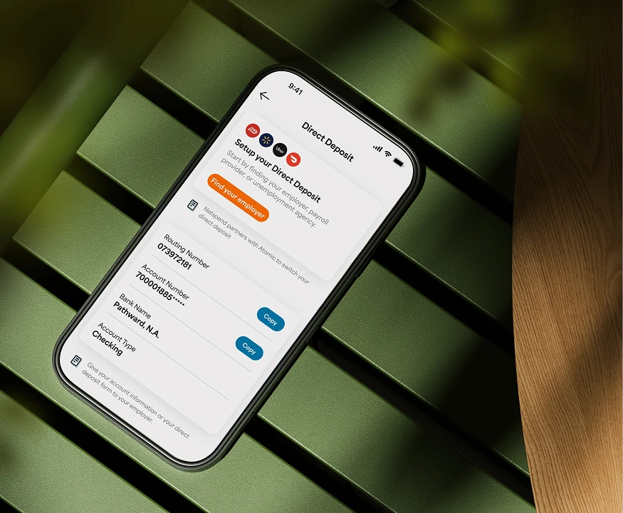 A phone with displaying the direct deposit screen of the Netspend app