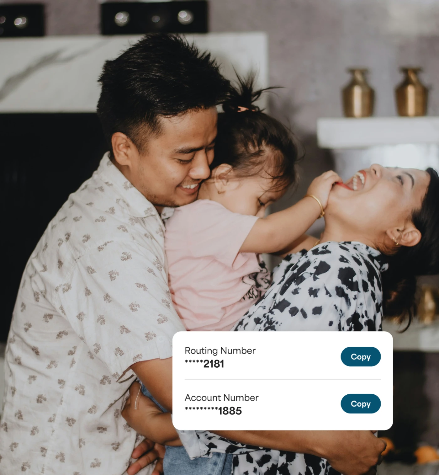 Happy family with an overlay showing direct deposit routing and account numbers