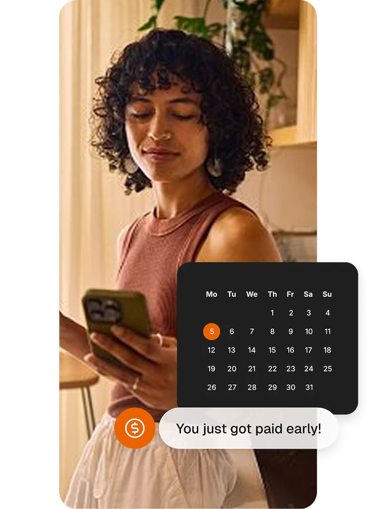 Woman with phone being paid early
